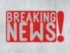 Breaking news icon on grey textured background