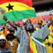 A Ghanian supporter cheers on January 20, 2013 before the start of a 2013 Africa Cup of Nations football match between Ghana and the Democratic Republic of Congo at the Nelson Mandela Bay Stadium in Port Elizabeth. AFP PHOTO / STEPHANE DE SAKUTIN