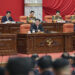 In this photo provided by the North Korean government, North Korean leader Kim Jong Un delivers a speech during a year-end plenary meeting of the ruling Workers’ Party in Pyongyang, North Korea, Thursday, Dec. 28, 2023. Independent journalists were not given access to cover the event depicted in this image distributed by the North Korean government. The content of this image is as provided and cannot be independently verified. Korean language watermark on image as provided by source reads: "KCNA" which is the abbreviation for Korean Central News Agency. (Korean Central News Agency/Korea News Service via AP)