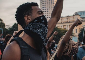 people protesting in a rally